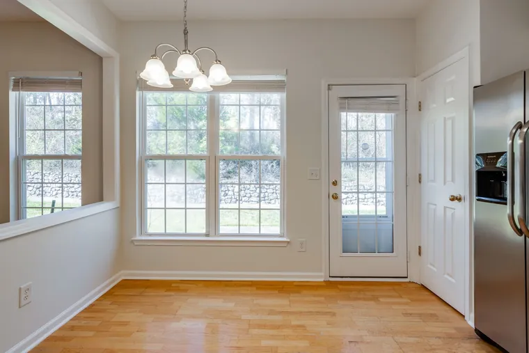 Eat-in breakfast area with a door to the patio